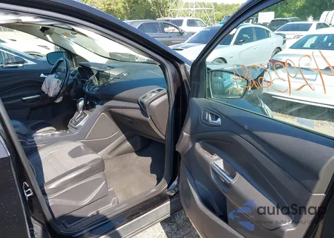 2013 Ford Escape Titanium z USA, uszkodzony, nr VIN 1FMCU0J93DUD65586